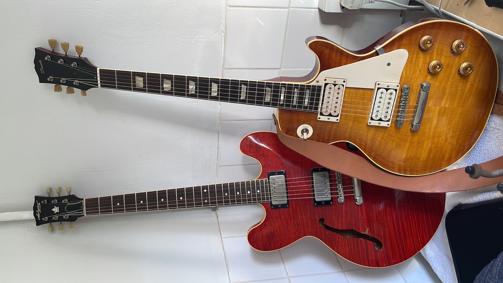 The ESP flame maple 335 and a Daniels Les Paul replica